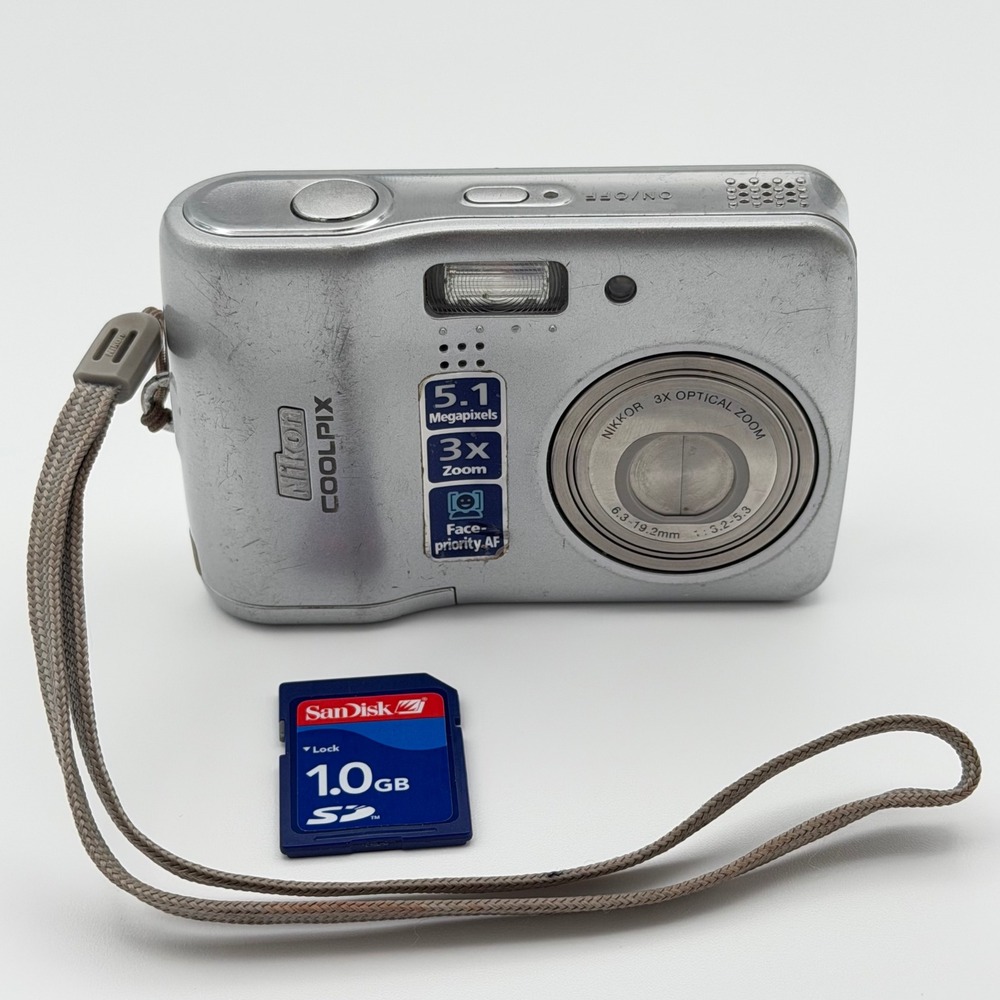 Nikon Coolpix L3 Digital Camera Silver 5.1MP 3x Zoom With SD Card Tested Works